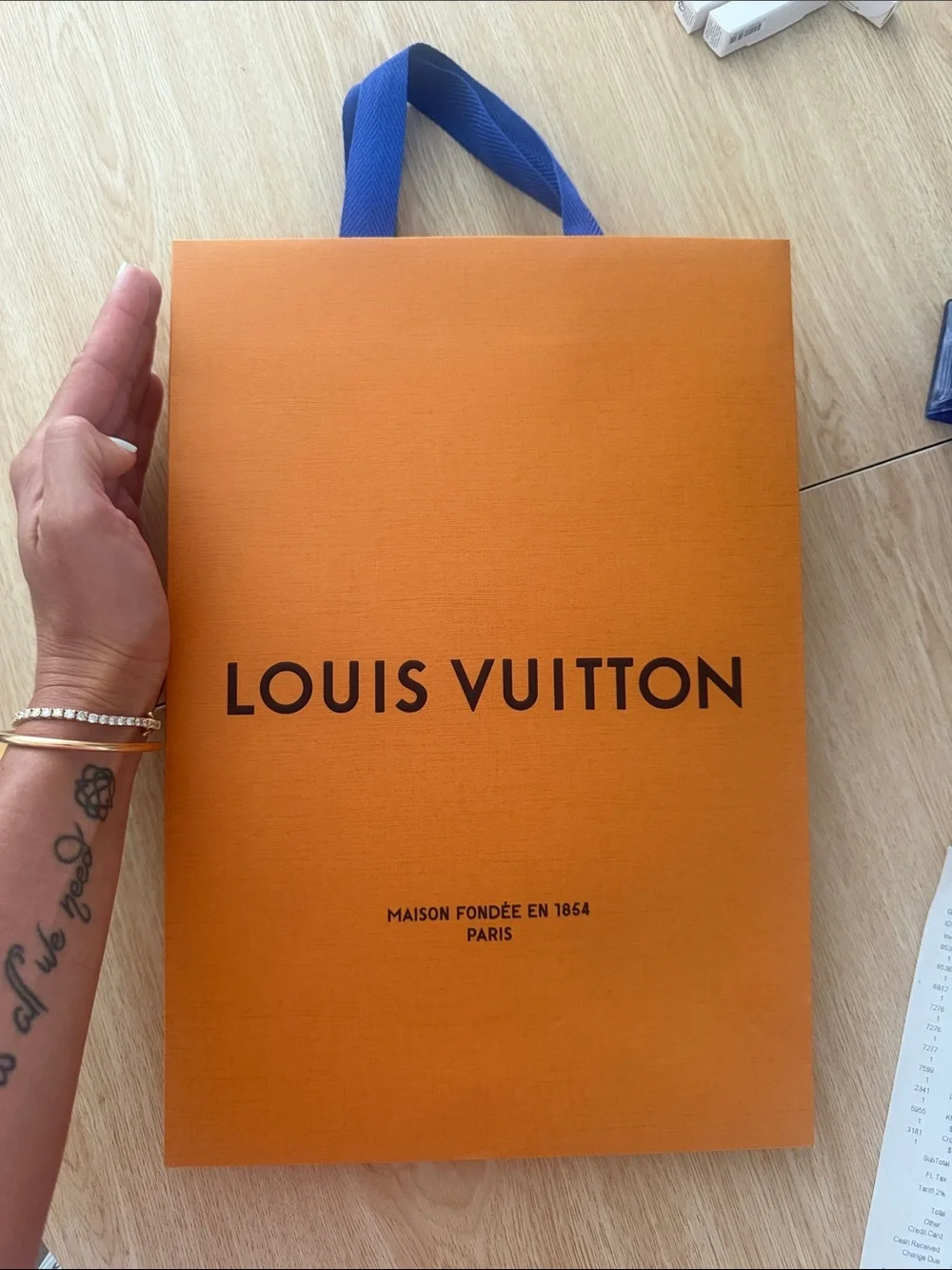 Louis Vuitton Orange Gift Bag with Blue Handles